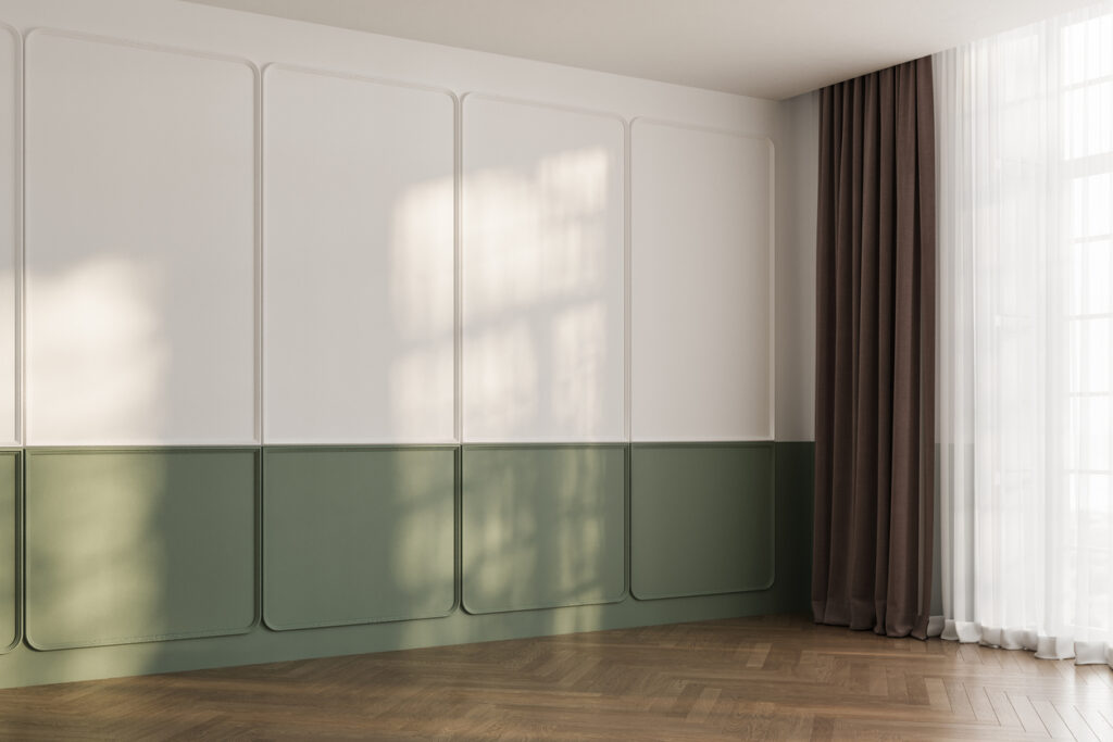 White and green classic wall background, brown parquet floor. Sunlight on wall Two-toned interior wall painting