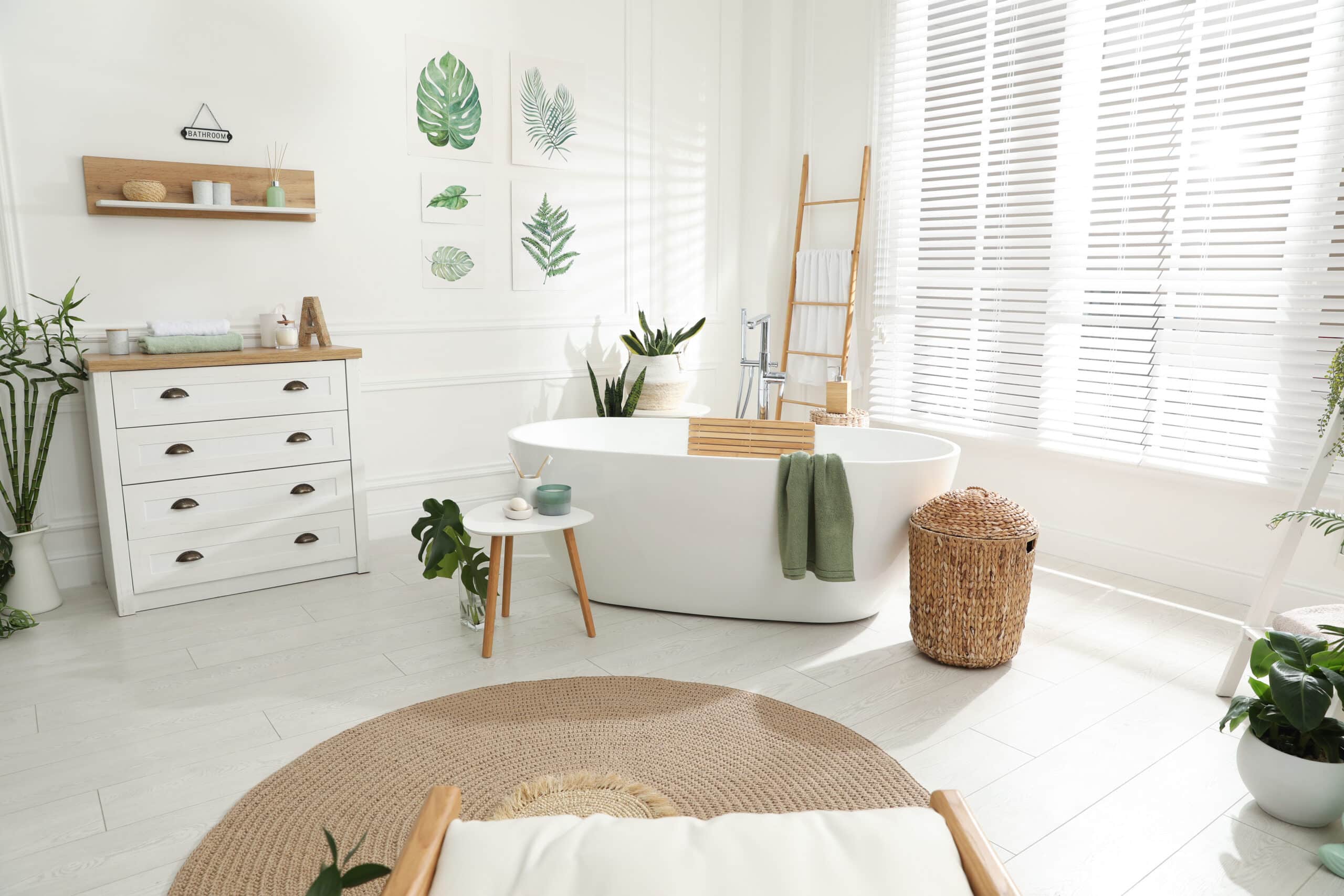 Stylish bathroom interior with green plants. Home design